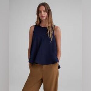 Club Monaco medium peplum navy blouse…